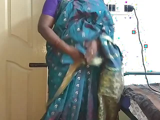 desi indian tamil telugu kannada malayalam hindi horny numero uno wife vanitha wearing blue colour saree showing big boobs and shaved pussy rattle hard boobs rattle nip scraping pussy masturbation porn video